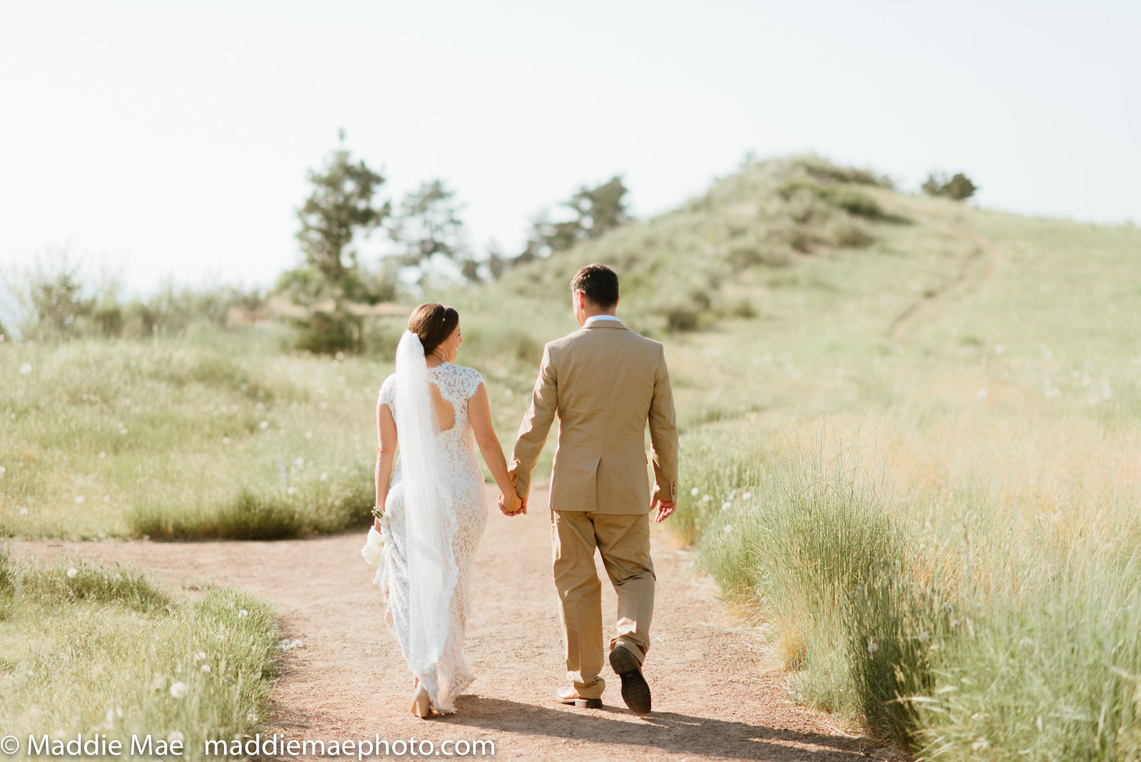 The Bensons were taking post-ceremony photos at the Horsetooth Reservoir in Fort Collins, Colorado, on June 20, when a RATTLESNAKE decided to have a little snack.